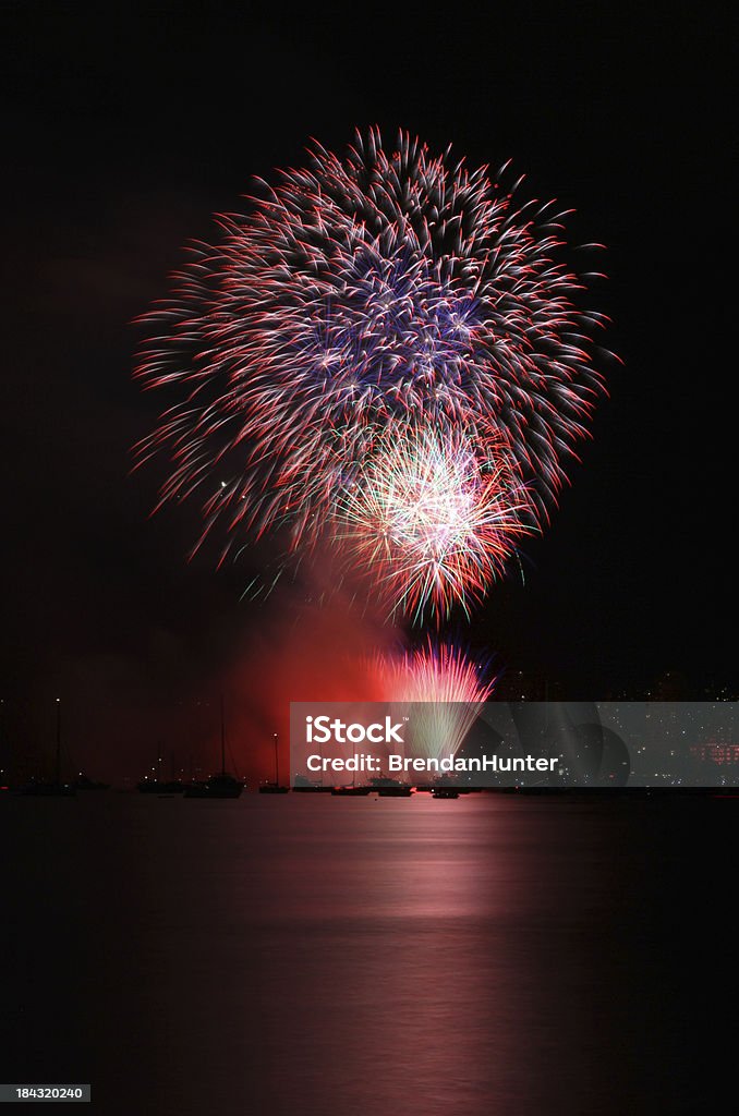 Sea Turned Red The sea turned red beneath fireworks in Vancouver. Anchored Stock Photo