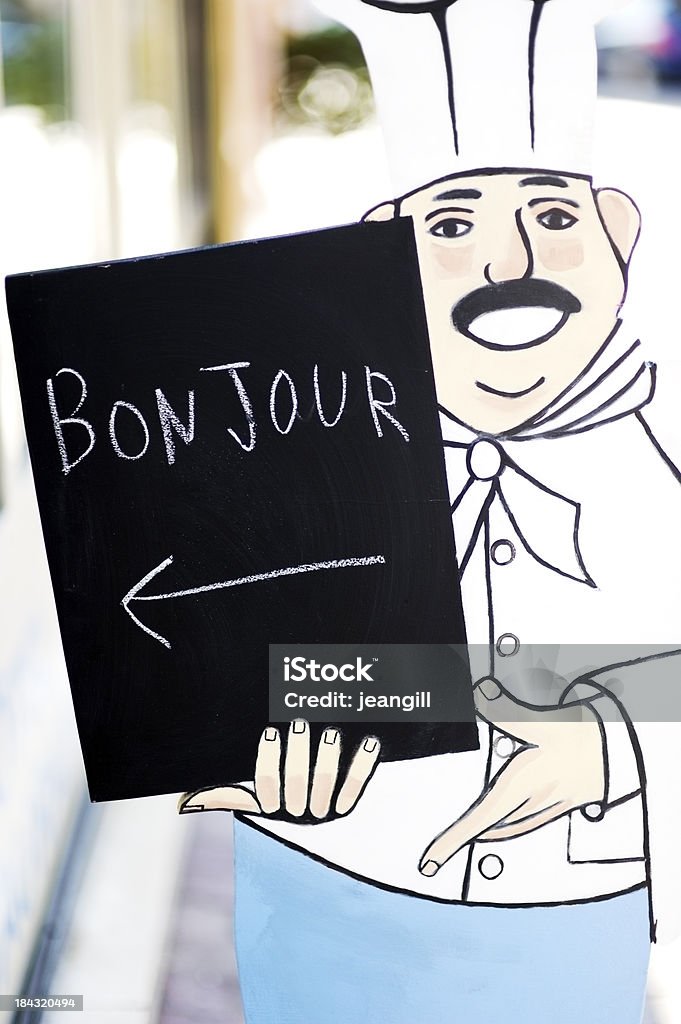 French chef with Bonjour sign French chef figure with Bonjour sign outside food shop in ProvenceMore like this Adult Stock Photo