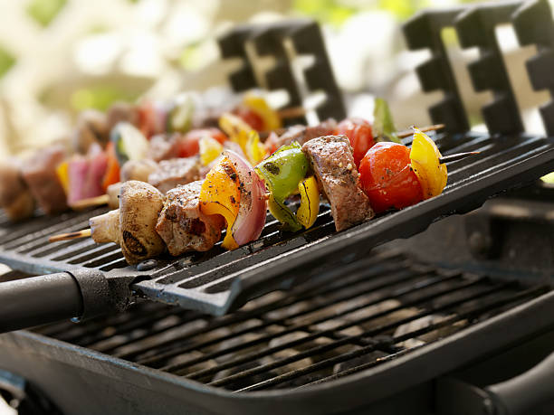 istock Beef and Vegetable Kabobs on a Outdoor BBQ 184320806