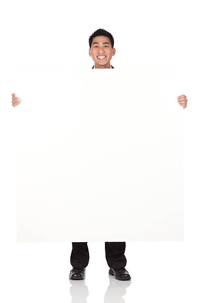 istock Businessman standing with a placard 184321166