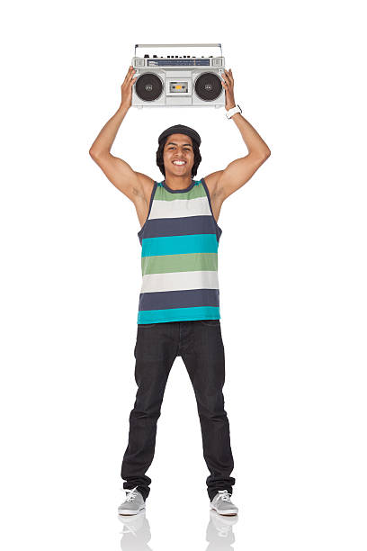 Man holding aloft a boom box Man holding aloft a boom boxhttp://www.twodozendesign.info/i/1.png boom box stock pictures, royalty-free photos & images