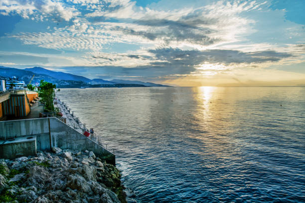 Fantastic  sunrise view from Monaco - sailboats  anchored (free of charge)   View towards of Italian coastline!