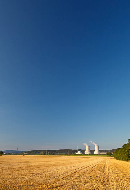 istock Nuclear Power Plant And Golden Field 184321427