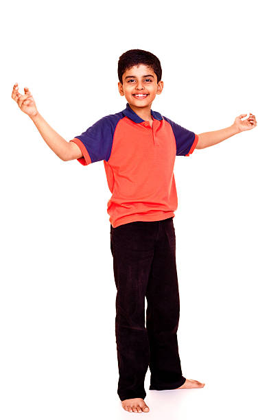 istock Isolated Indian Boy Standing Smiling Open Arms Hands Full Length 184321883