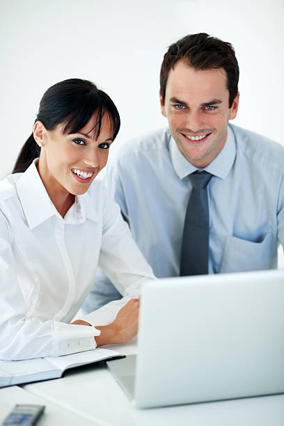 istock Smiling business people in office 184321919