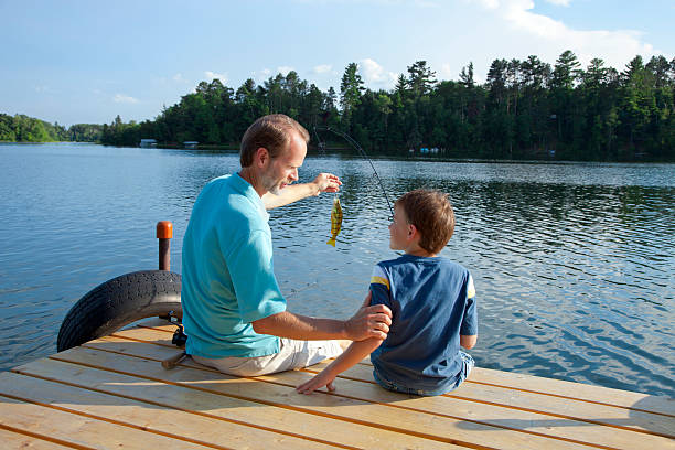 istock Father and Son Fishing 184322135