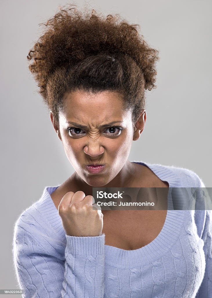 Very angry woman close up picture of a very angry african american beautiful woman  (this picture has been taken with a super high definition Hasselblad H3D II 31 megapixels camera) African Ethnicity Stock Photo