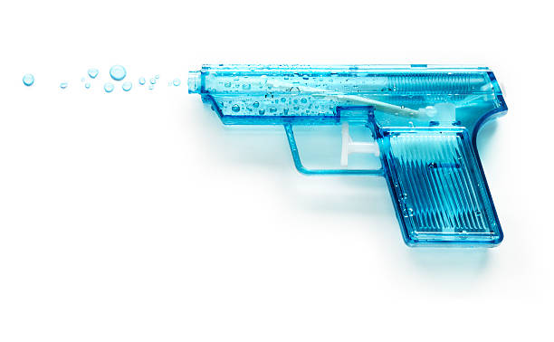 pistola de agua - toy gun fotografías e imágenes de stock