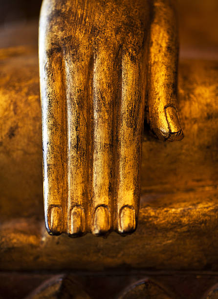 istock golden thai buddha hand detail 184323041