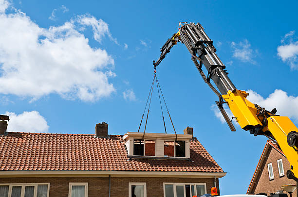 Dormer Construction A prefab dormer is installed with a crane on a roof Similar images: dormer stock pictures, royalty-free photos & images