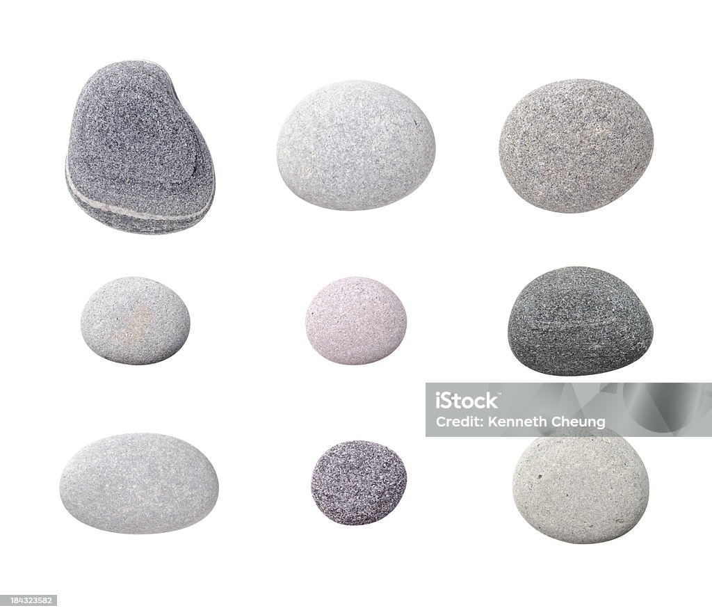 Assorted Pebbles "Assorted pebbles, isolated on white background." Pebble Stock Photo