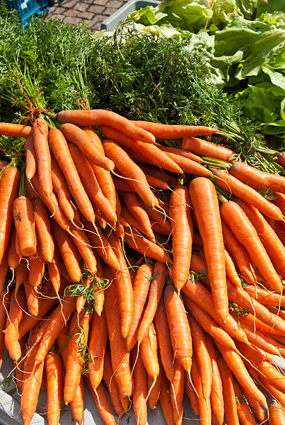 istock Organic carrots on market 184323713