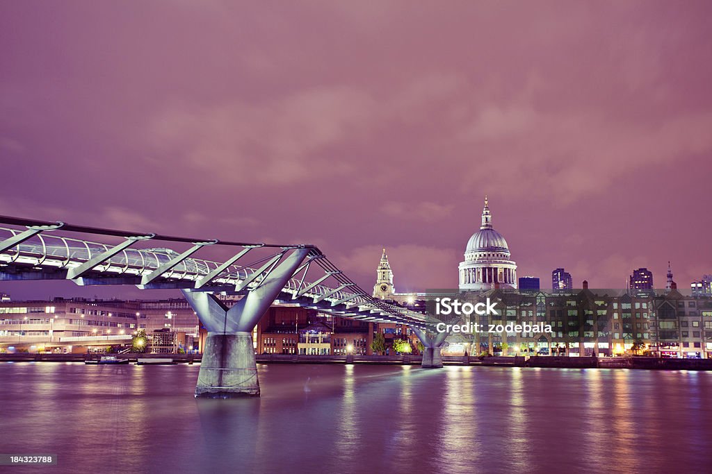 London Millenium Bridge and St. Paul's Catherdal at Night London skyline with the river Thames and Millennium Bridge London - England Stock Photo