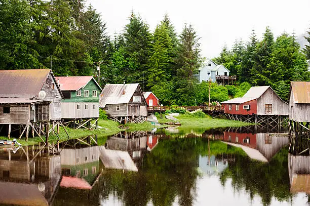 "Houses built on Hammer Slough, a fishing village on Mikkof Island on the west coast of Southeast Alaska. Of Norwegian origins and culture, it now has Alask'a largest halibut fleet."