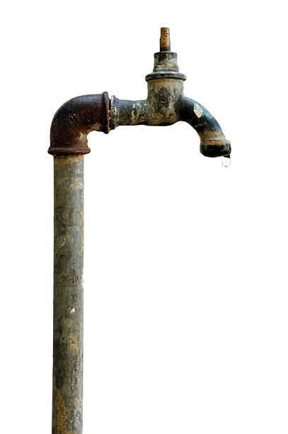 Rusty old outdoors water tap isolated on white.