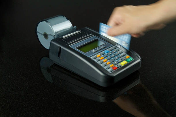istock Swiping Credit Card 184324419