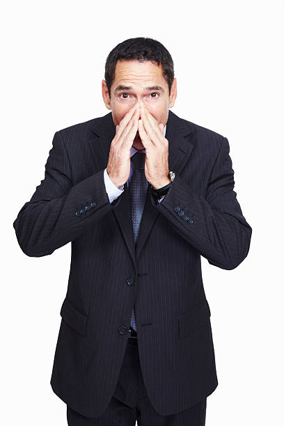 istock Business man covering his nose 184324908