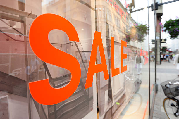 istock Sale sign in shop window 184325780