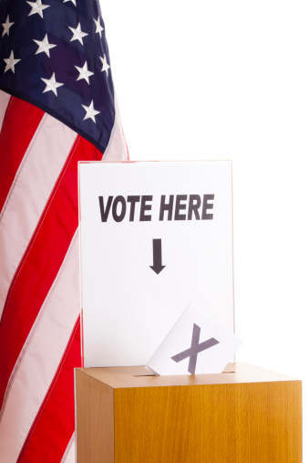 Election concept. Vote in a ballot box. Vertical. White background.