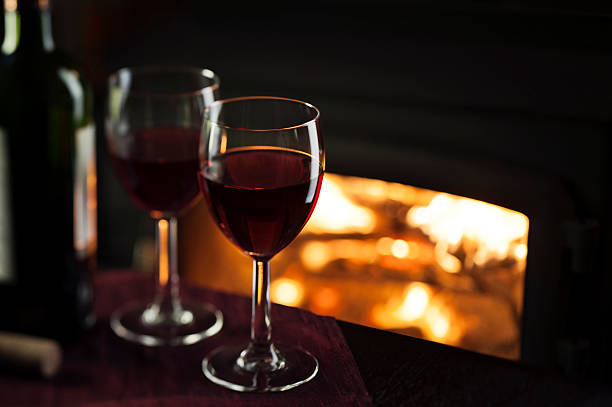 Red Wine by the Fire stock photo