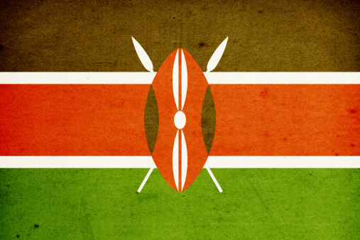 Close-up on a paper flag of Kenya with light effect and vignette. Visible paper texture for super realistic effect. Selective focus. Canon 5D Mark II and Sigma lens.SEE MORE STATE FLAGS BELOW: