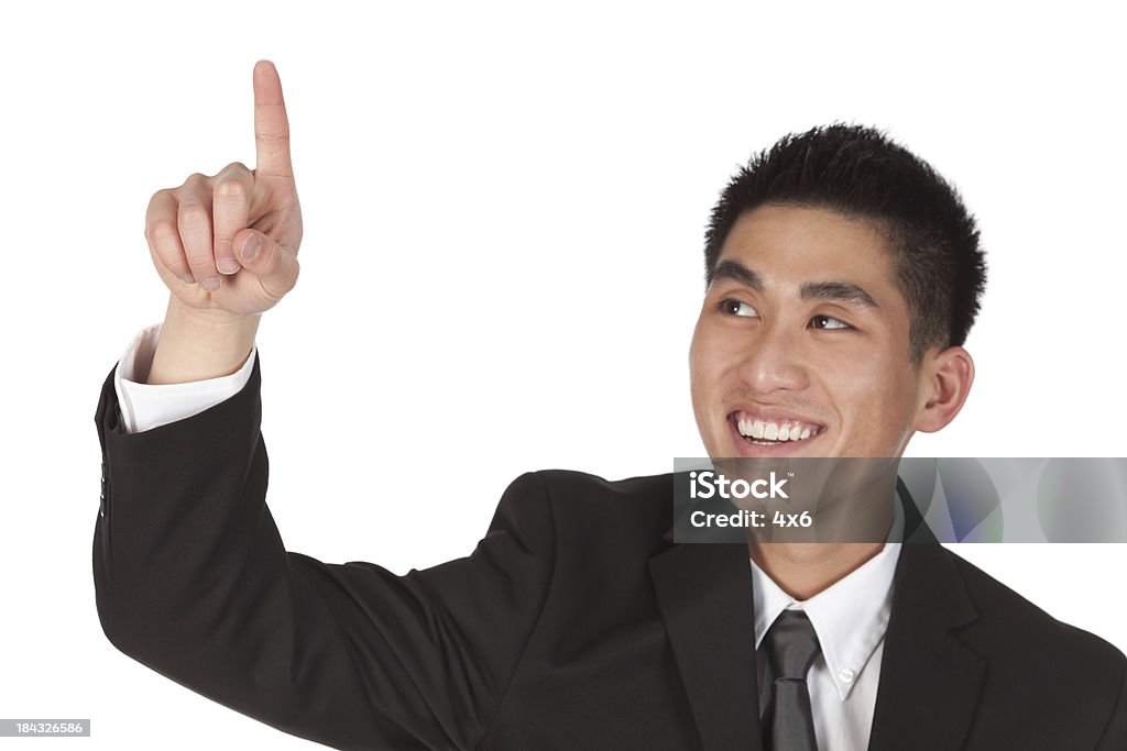 Бизнесмен с палец, указывающий на что-то, - Стоковые фото 'Номер один' знак пальцем роялти-фри