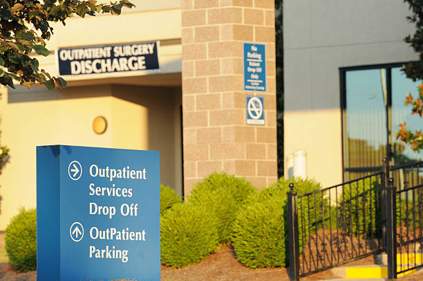 Outpatient buildng parking sign stock photo