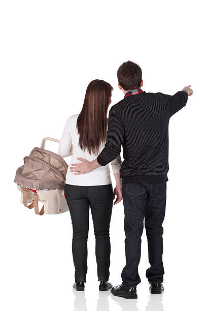 Couple with a baby seat