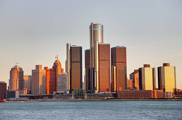 Detroit, Michigan Detroit city skyline along the Detroit River at dusk. Detroit is the largest city in the state of Michigan and the seat of Wayne County. Detroit is a major port city ont he Detroit River known as  birthplace of the automotive industry and an important source of popular music legacies detroit michigan stock pictures, royalty-free photos & images