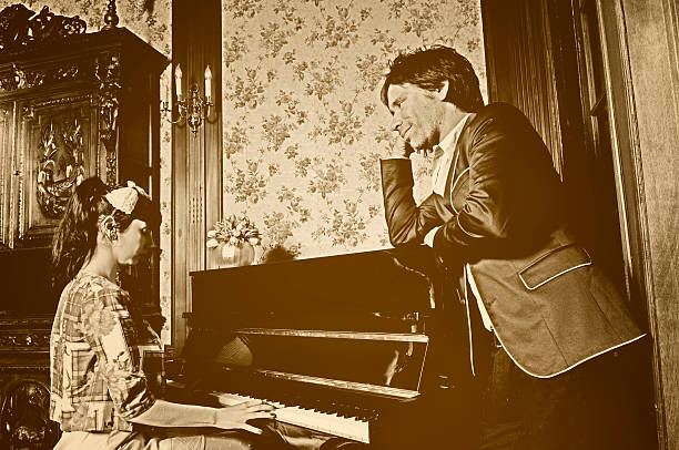 istock Retro style piano couple 184327302