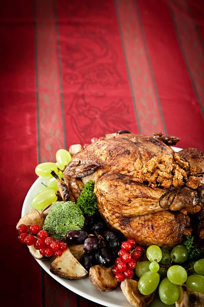 istock Thanksgiving Dinner with Stuffed Turkey and Side Dishes 184327504