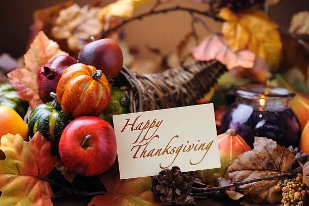 Photo of Autumn decoration with thanksgiving card