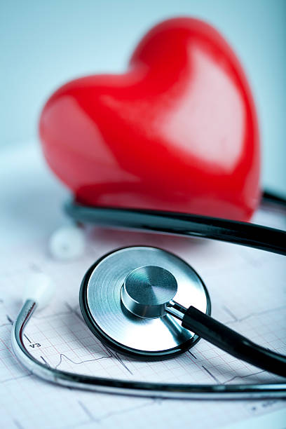 Heart, stethoscope and EKG stock photo