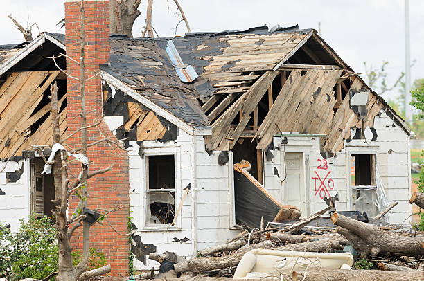 istock Home severely damaged by tornado 184328118