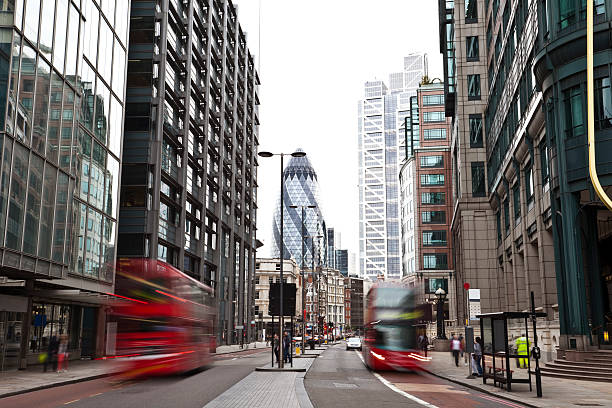 istock London street with double-decker buses 184328197