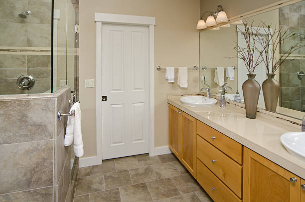 istock Modern bathroom with tile shower and floor 184329608