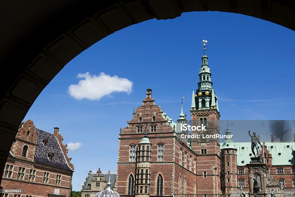 Frederiksborg Castle Frederiksborg castle is located in Hillerod, Denmark. It was built as a royal residence for King Christian IV with the oldest parts dating back to 1560. Now houses The Museum of National History. Arch - Architectural Feature Stock Photo