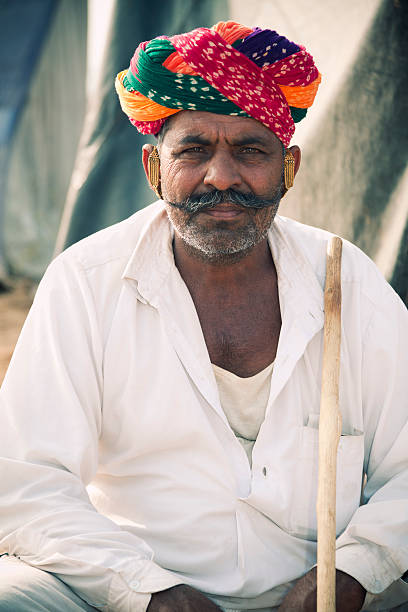 istock Indian Cattle Trader At The Pushkar Fair In India 184329748