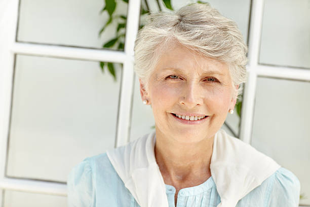 istock Senior woman with a charming smile 184329997