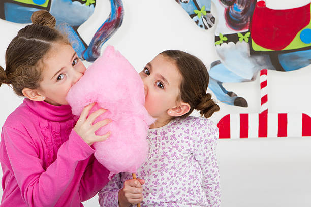 istock Happy friends having fun at amusement park - studio shot 184330392