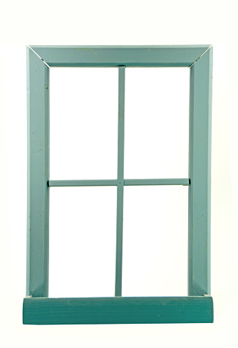 An old blue window frame on a white background with copy space.