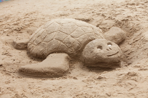 Sand castle on the beach near Cap Gris Nez (France), sunny evening in summer