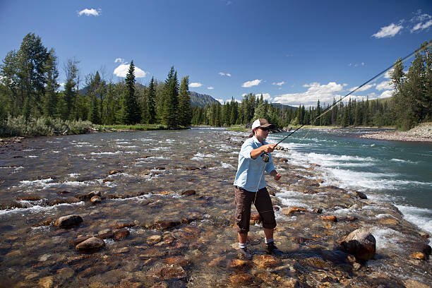istock Woman Fly Fishing 184330904