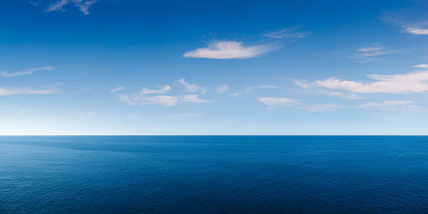 Deep Blue Ocean Panorama Full resolution jpeg is 112 megapixel (15000x7500). Huge resolution allows for heavy cropping, even to vertical formats. panoramic stock pictures, royalty-free photos & images