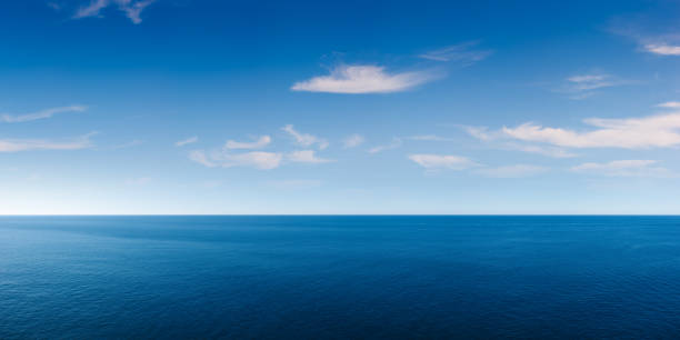 Deep Blue Ocean Panorama Full resolution jpeg is 112 megapixel (15000x7500). Huge resolution allows for heavy cropping, even to vertical formats. horizon stock pictures, royalty-free photos & images