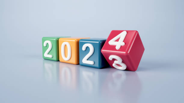 istock Colorful Cubes Changing From 2023 To 2024 Over Grey Background 1843310396