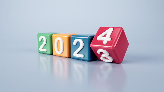 Abstract 2023 to 2024 new year concept transition with colorful cubes or blocks on gray background. Change calendar. Minimalist style counter. 3d model of 4 dices with numbers.