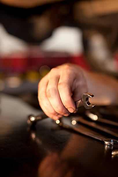 istock Mechanic holding a wrench to work with 184331154