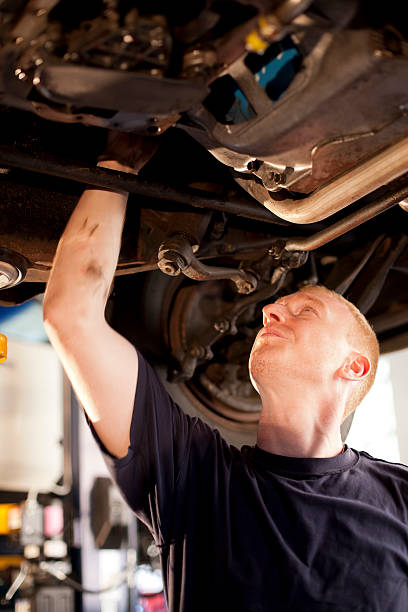istock Mechanic Works on a Car 184331156