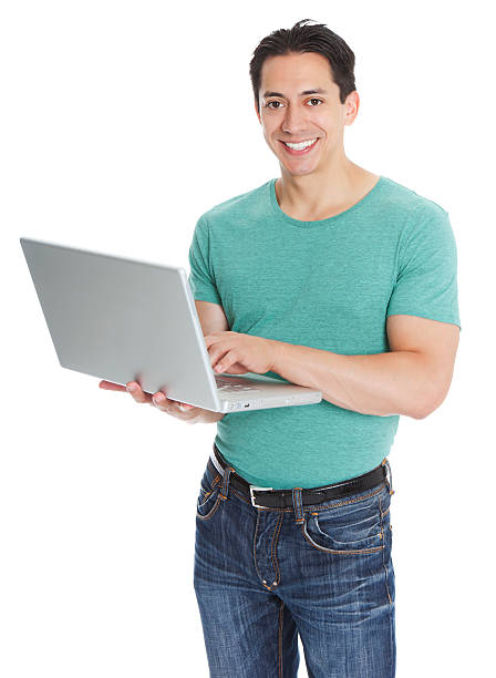 istock Portrait of cheerful young man using laptop 184331291